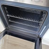After cleaning: oven interior restored to a much cleaner condition
